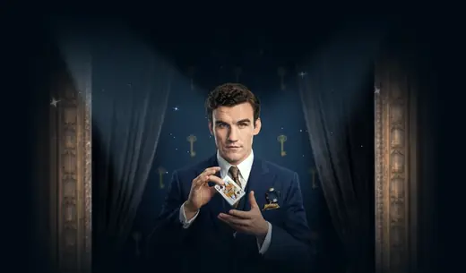 High roller in a navy suit, Elitespin casino bonus